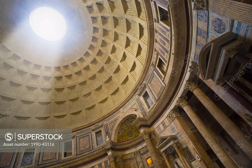 Interior of the Pantheon with a beam of light coming from the oculus, Rome, Italy