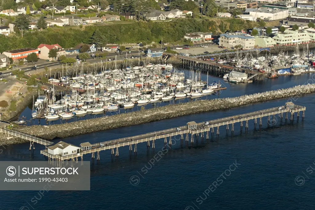 An aerial view of the waterfront marina and Discovery Pier that juts out into Discovery Passage. Campbell River, North Central Vancouver Island, Briti...