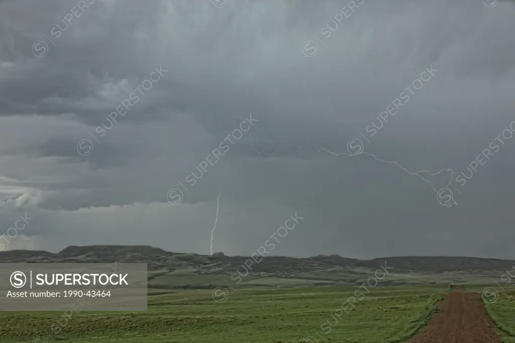 Lightning strikes over 70 Mile Butte, Grasslands National Park, Saskatchewan, Canada.