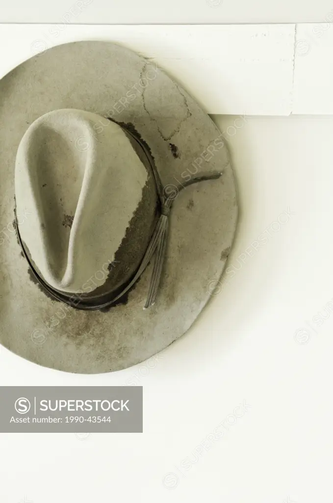 Cowboy hat hanging on a hook _ Bar U Ranch National Historic Site _ Alberta, Canada
