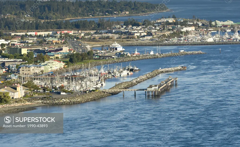 An aerial view of the waterfront of Campbell River and the Discovery Pier that juts out into Discovery Passage. Campbell River, North Central Vancouve...