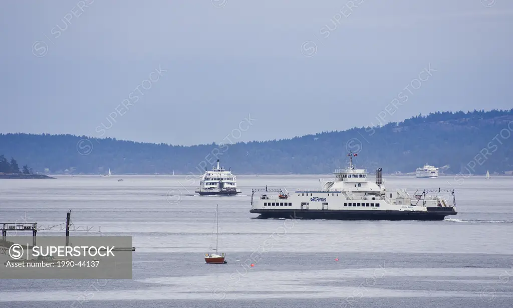 Three BC Ferries moving around between islands, Strait of Juan de Fuca, British Columbia, Canada