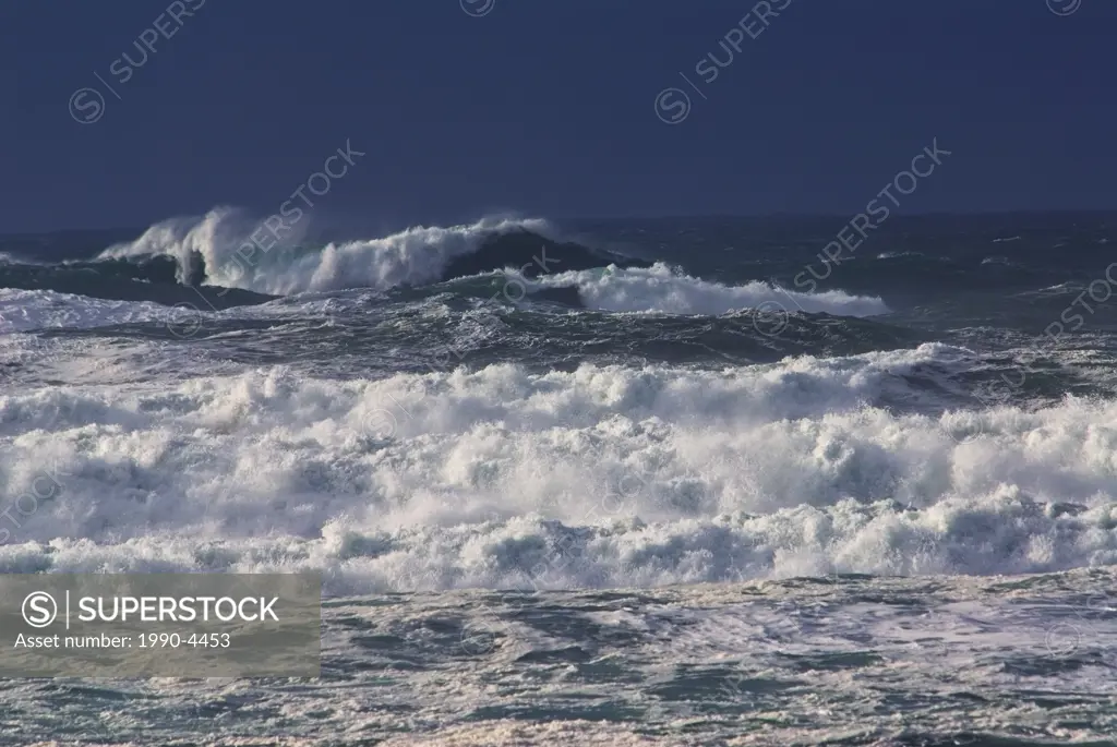 Winter surf whips the Pacific Ocean into a frenzy off Cox Bay on Vancouver Island, British Columbia, Canada