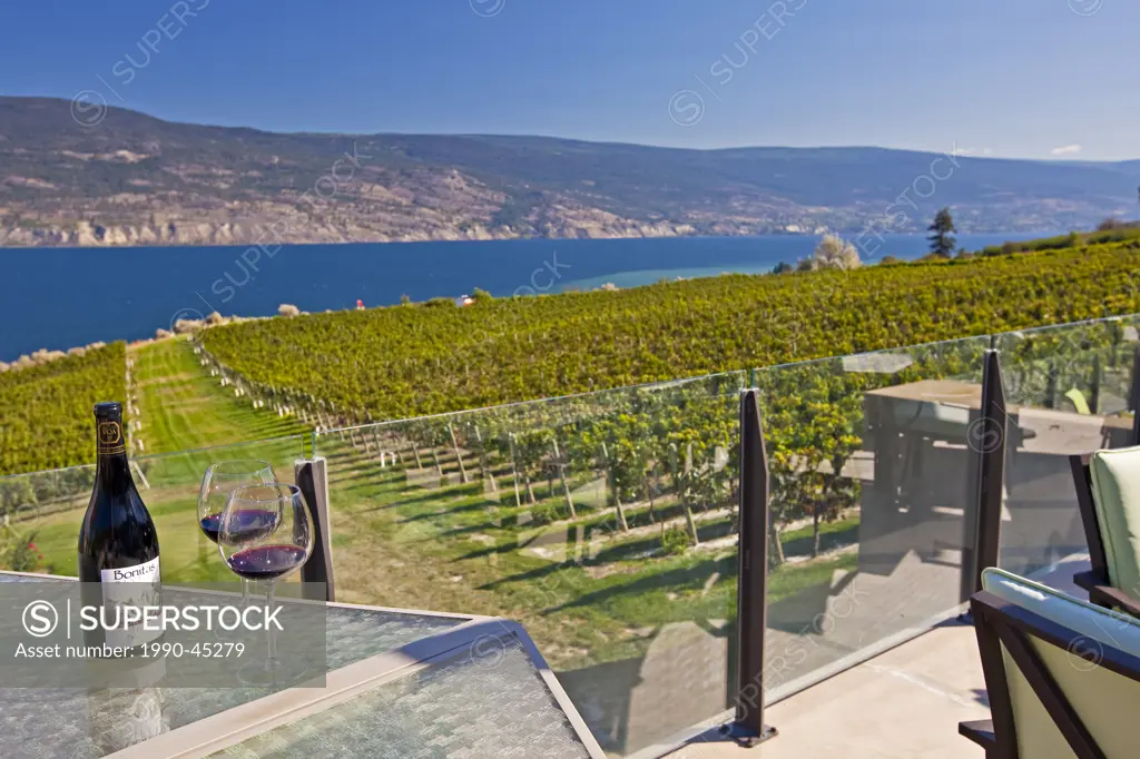 Wine served on the terrace overlooking grapevines and Okanagan Lake at Bonitas Winery, Summerland, Okanagan_Similkameen Region, Okanagan, British Colu...