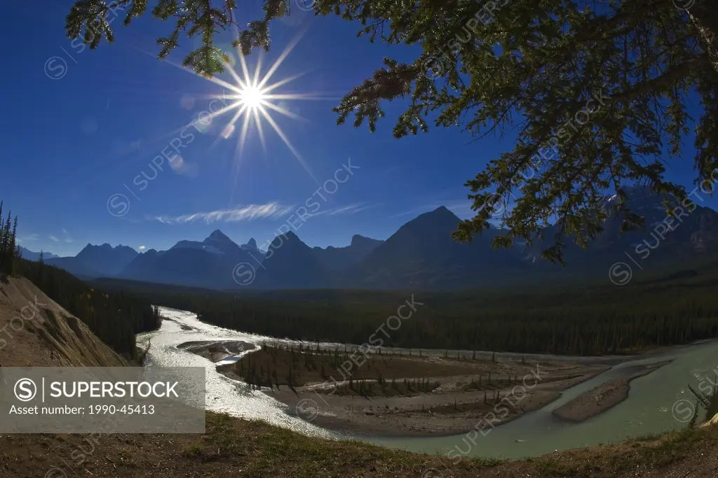 The Canadian Rocky Mountains and the Athabasca River at the goat lick on the icefields parkway, Jasper National Park, Alberta, Canada.