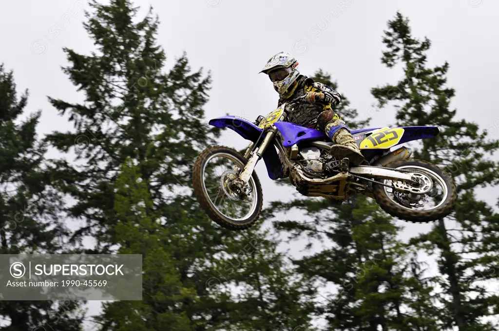 Motocross rider 125 gets airborne during a jump at the Wastelands track in Nanaimo, British Columbia, Canada.