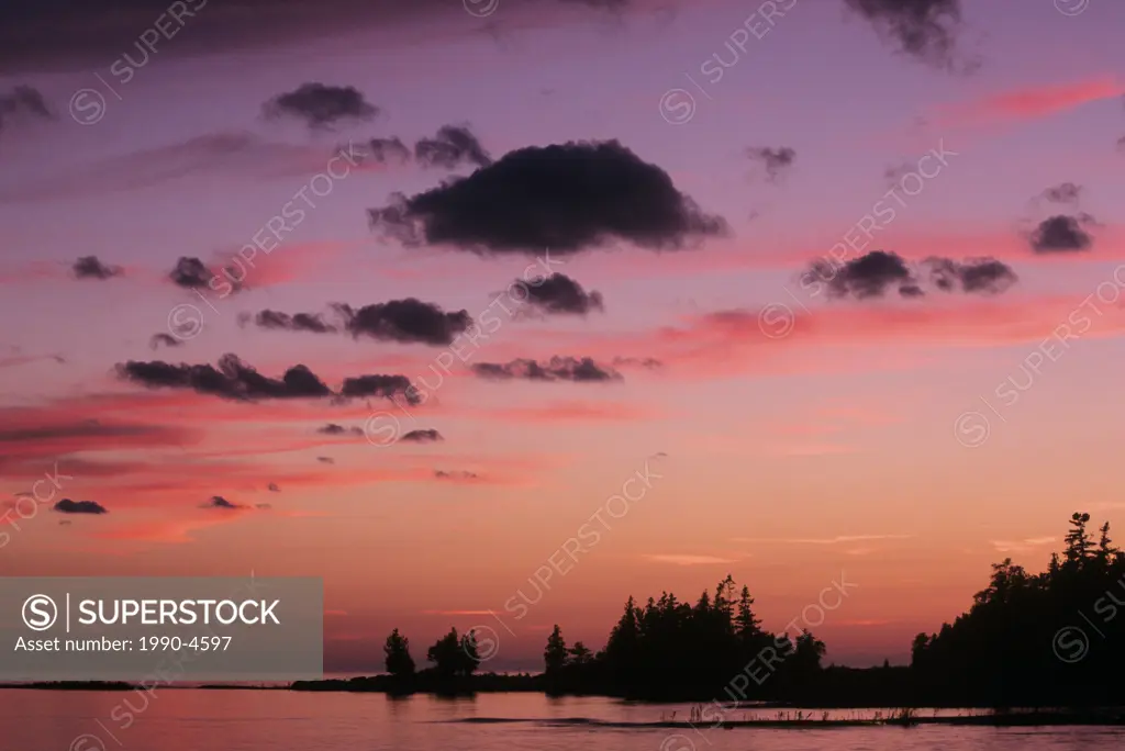The sun sets Lake Huron in Fathom Five National Marine Park, Tobermory, Ontario, Canada