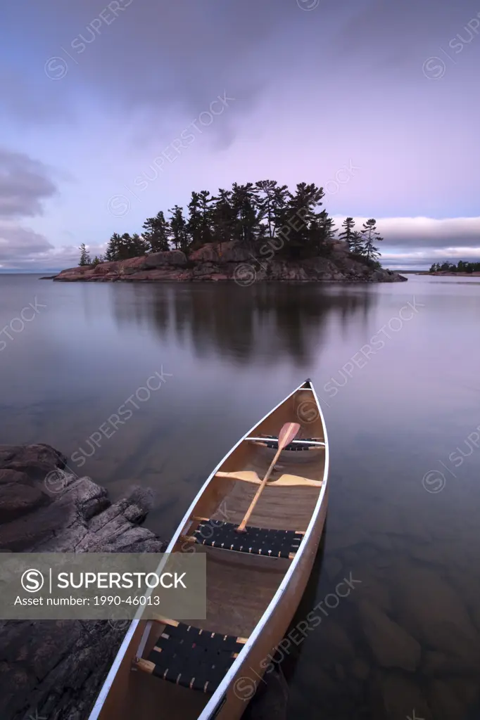 Canoe and Island in Georgian Bay, Killarney Provincial Park, Ontario, Canada.