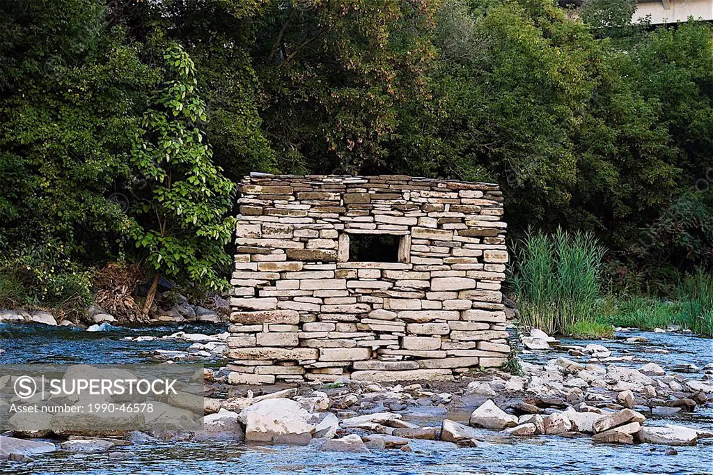 Stacked wall of rocks with window, Credit View River, Mississauga, Ontario, Canada