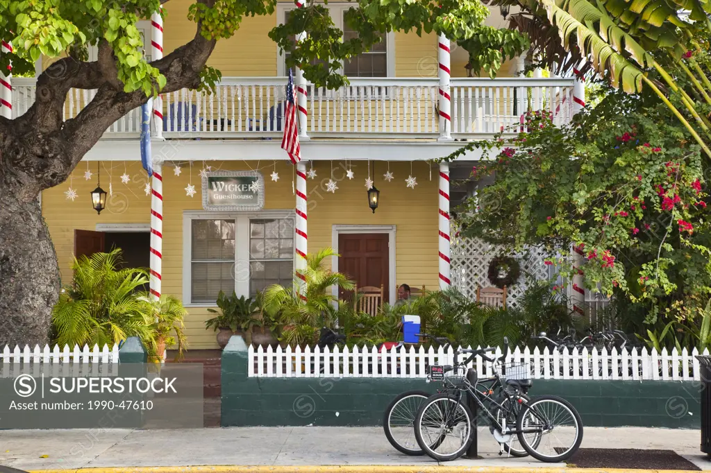 Portico of a quaint guesthouse on Duval Street in the old district of Key West, Florida, United States of America.