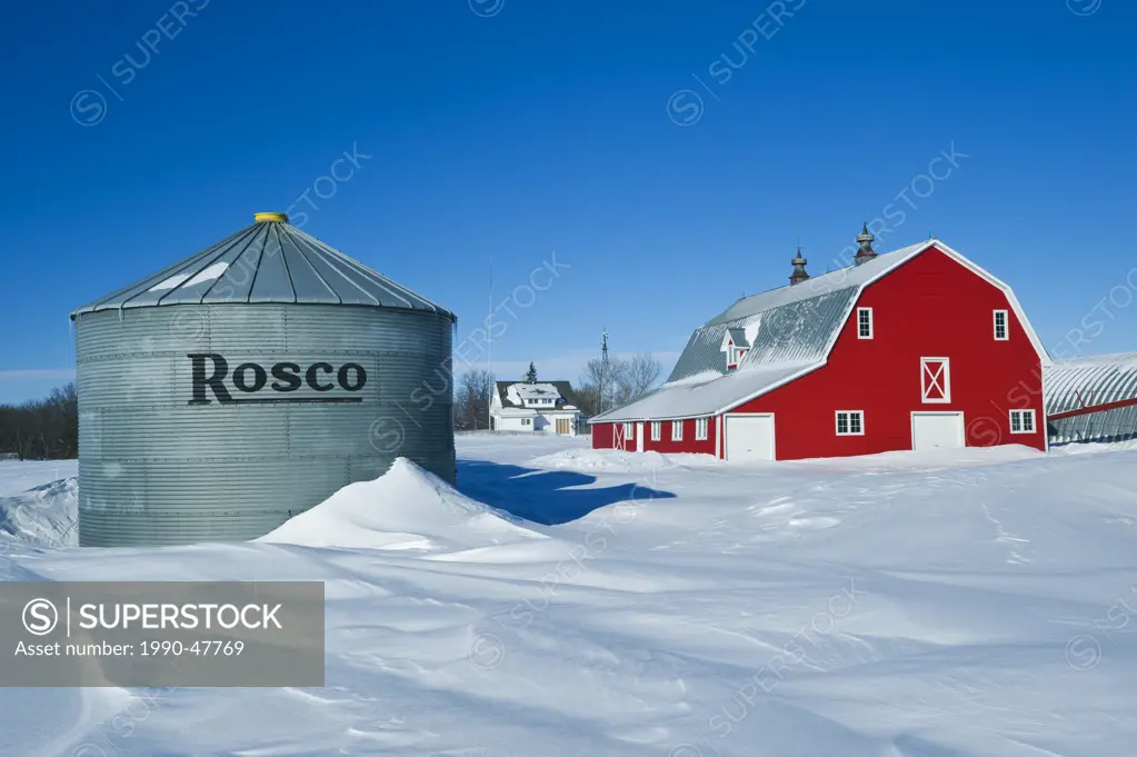 Red barn and grain bins near Torquay Saskatchewan, Canada