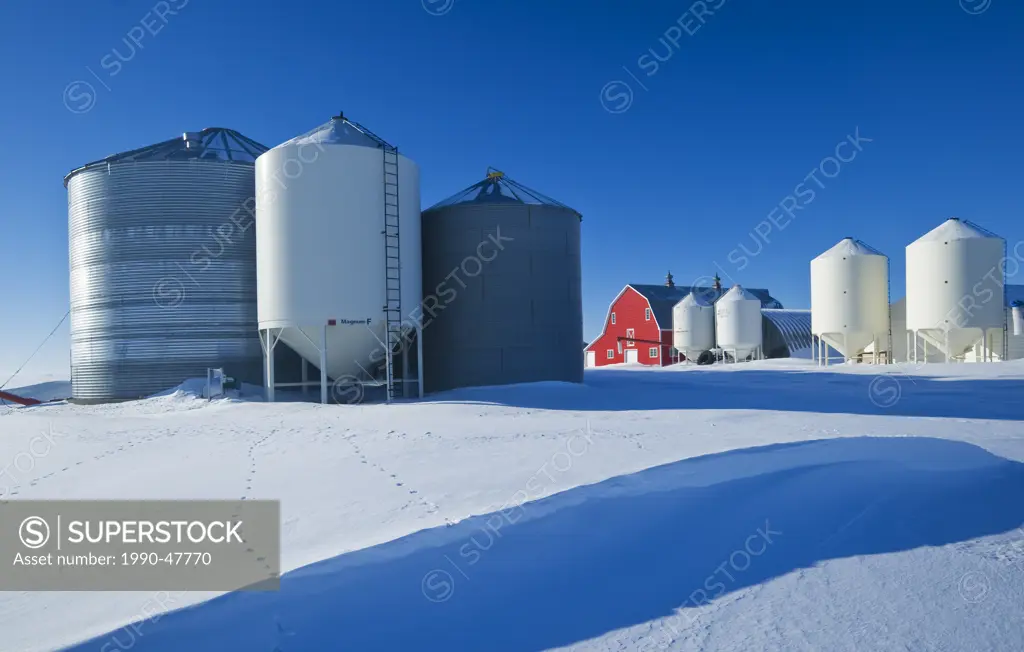 Red barn and grain bins near Torquay Saskatchewan, Canada