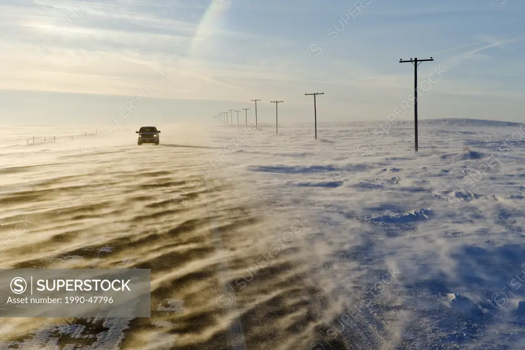 Road covered with blowing snow, near Verwood, Saskatchewan, Canada