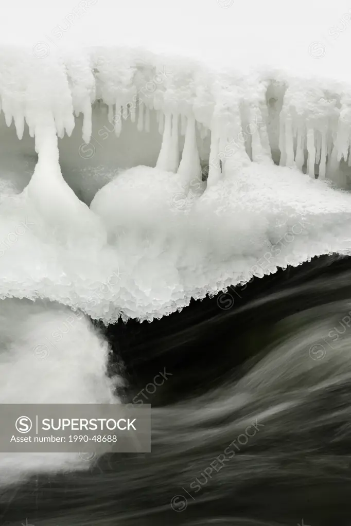 Junction Creek rapids with snow and shroeline ice, Lively, Greater Sudbury, Ontario, Canada