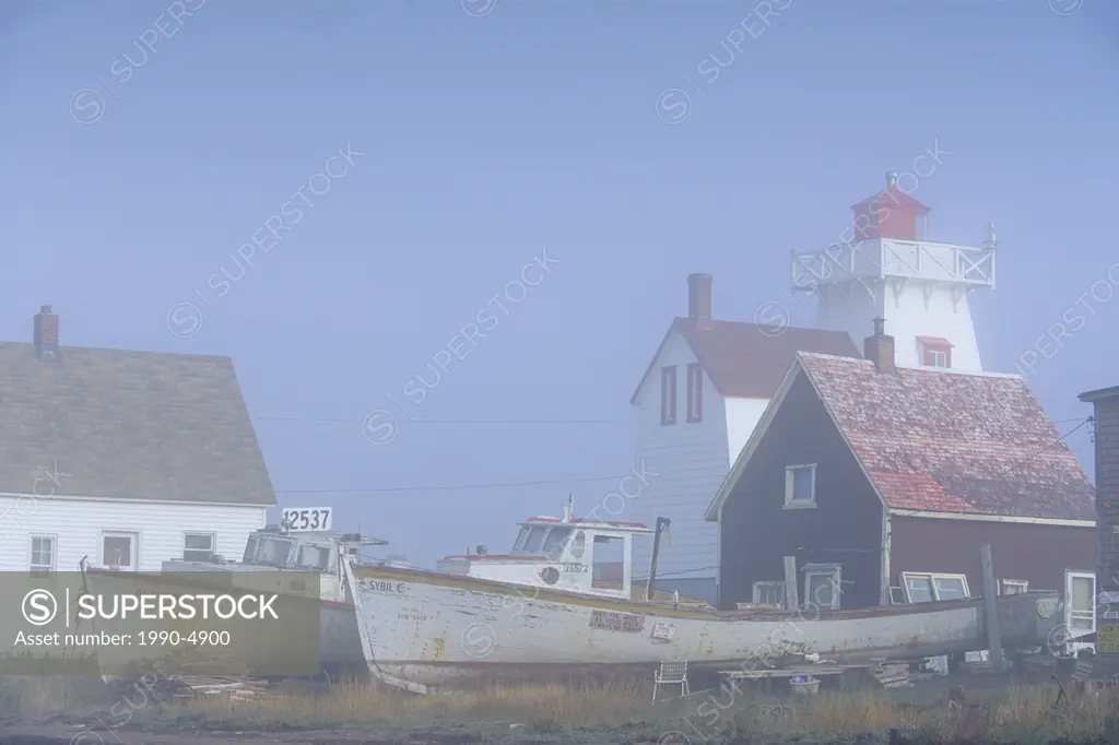 North Rustico lighthouse in mist, Prince Edward Island, Canada