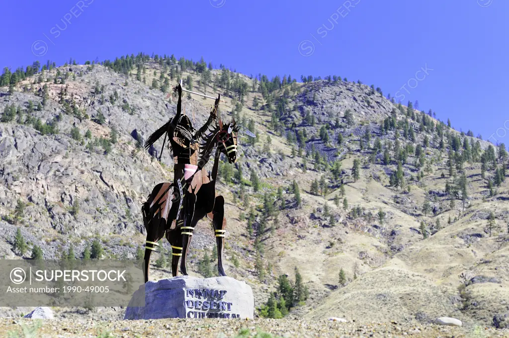 A statue of a native Indian with head dress, on a horse at Nk´Mip Desert Cultural Centre, Osoyoos, British Columbia, Canada