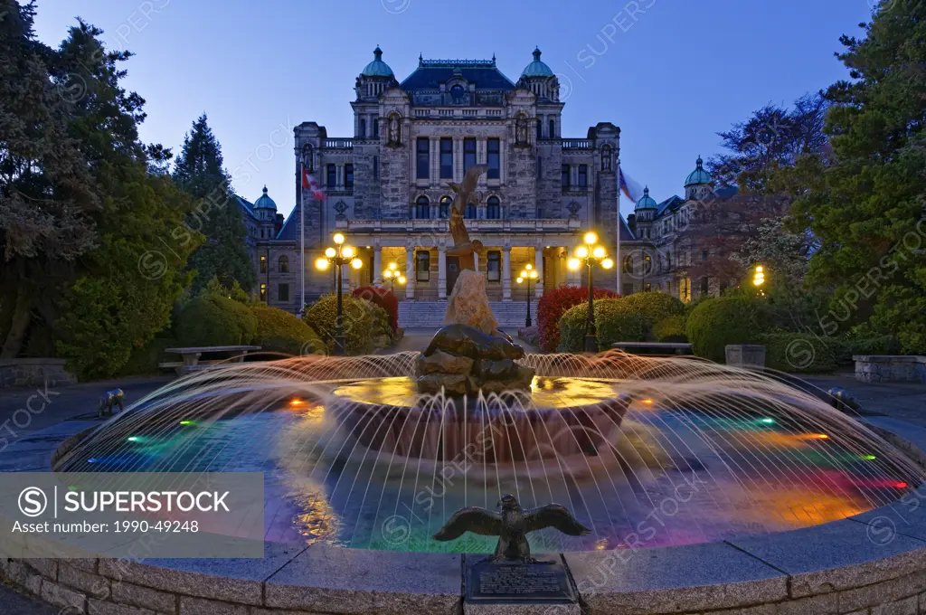 Fountain illuminated at night at the rear of the British Columbia Legislature, Victoria, British Columbia, Canada