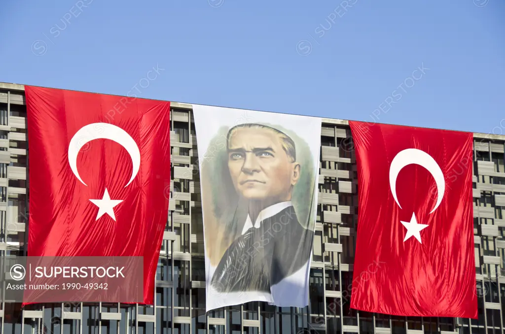 Portrait of Mustafa Kemal Atatürk and Turkish Flags on the Atatürk Cultural Center, Istanbul, Turkey