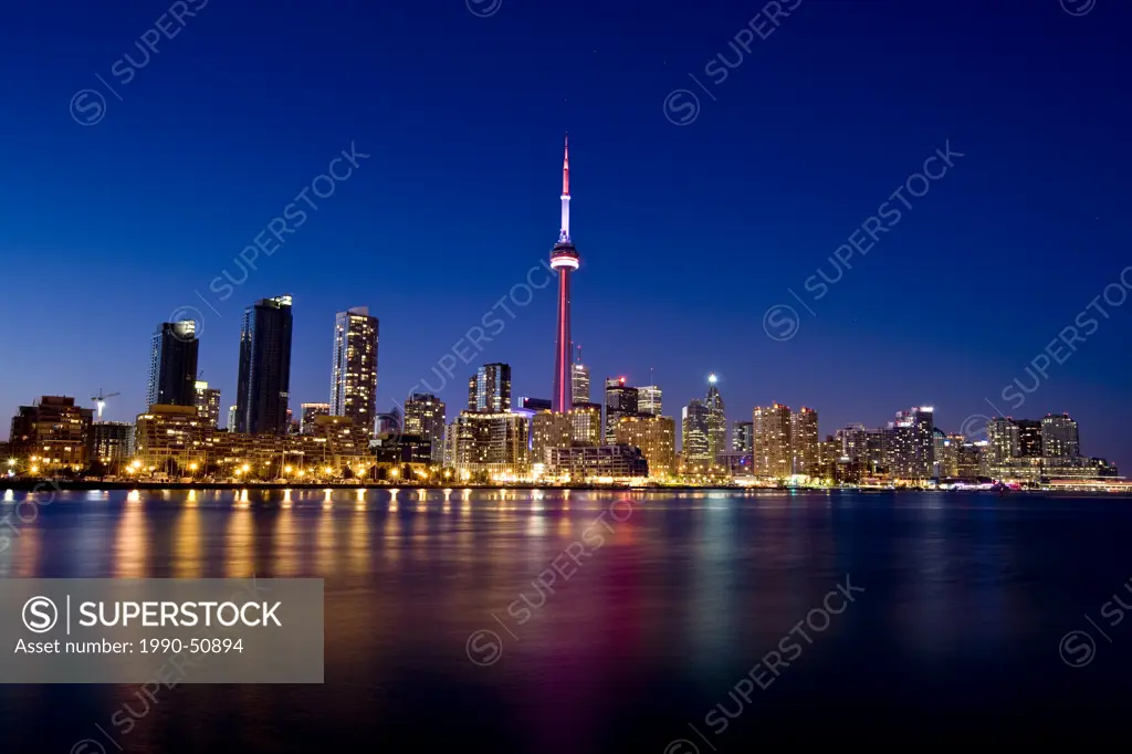 Toronto skyline at night viewed from Island Airport, Ontario, Canada.