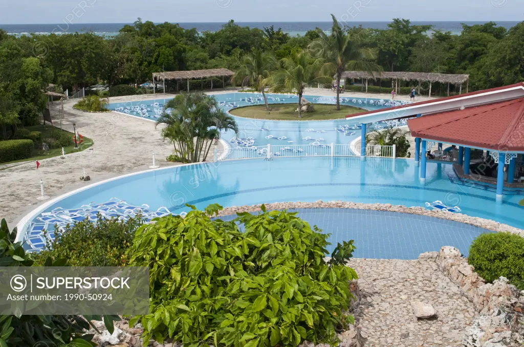 Pre hurricane preparation with lounge chairs placed in pools near Holguin, Cuba