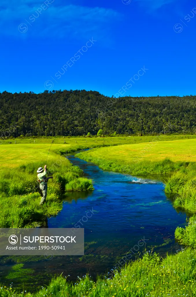 Man fly fishing, Lost Creek, Spring Creek, South Island, New Zealand