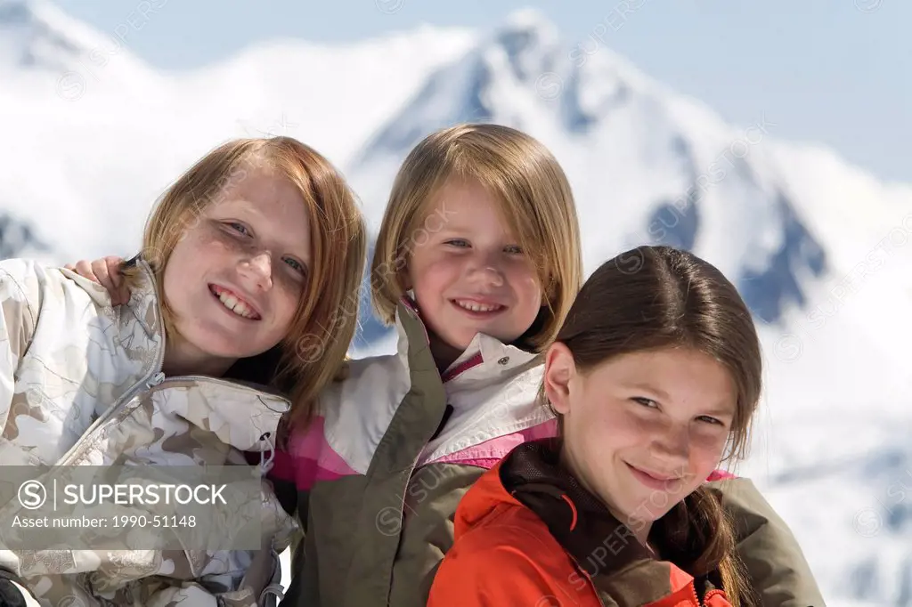 Three sisters enjoying a family vacation, Whistler, British Columbia, Canada.