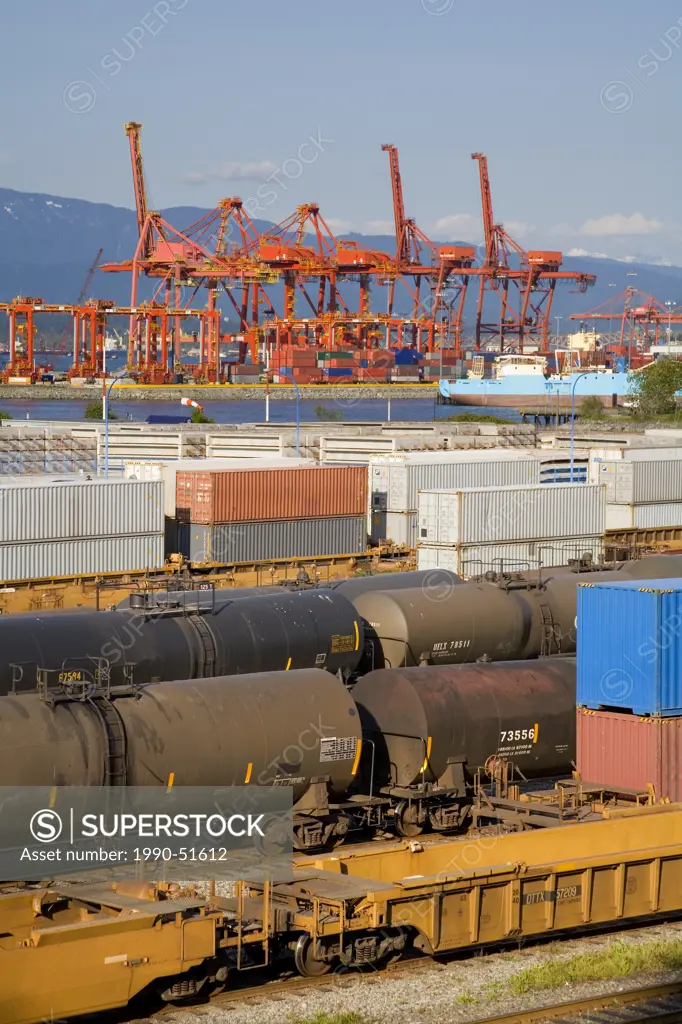 Waterfront train yard and container port, Vancouver Harbour, Vancouver, British Columbia, Canada.