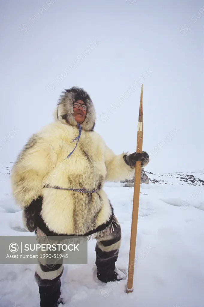 Inuit Elder, Simeonie Aqpik in traditional clothing, Kimmirut, Baffin Island, Nunavut, Canada.