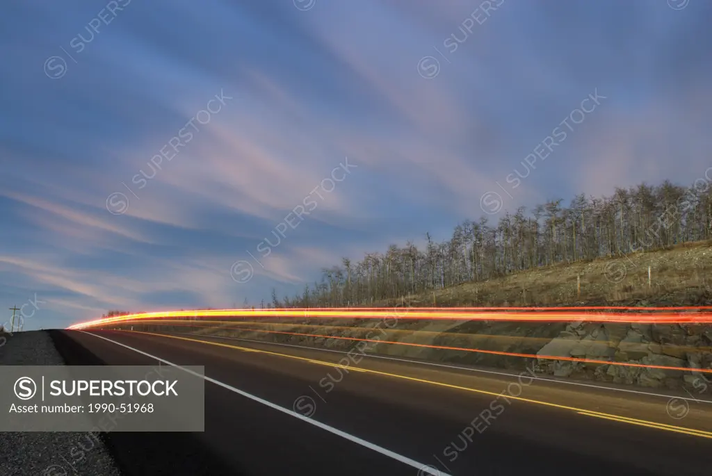 Highway and tail lights near Cochrane, Alberta, Canada