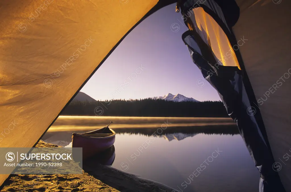 Canoe and tent, Bowron Lake Provincial Park, British Columbia, Canada.