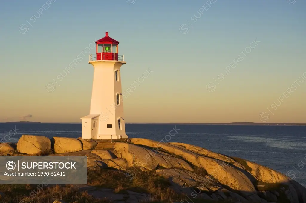 Sunrise on Peggy´s Cove Lighthouse. Peggy´s Cove, Nova Scotia, Canada.