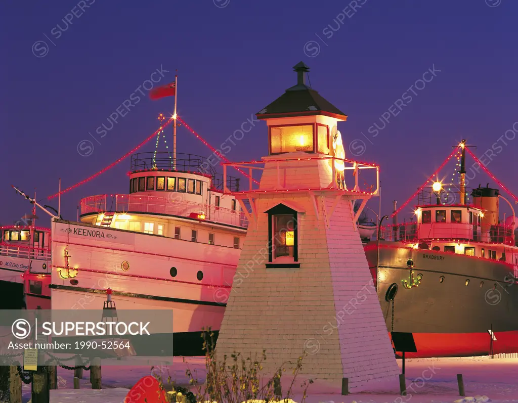 Christmas lights on ships and lighthouse, Marine Museum of Manitoba, Selkirk, Manitoba, Canada
