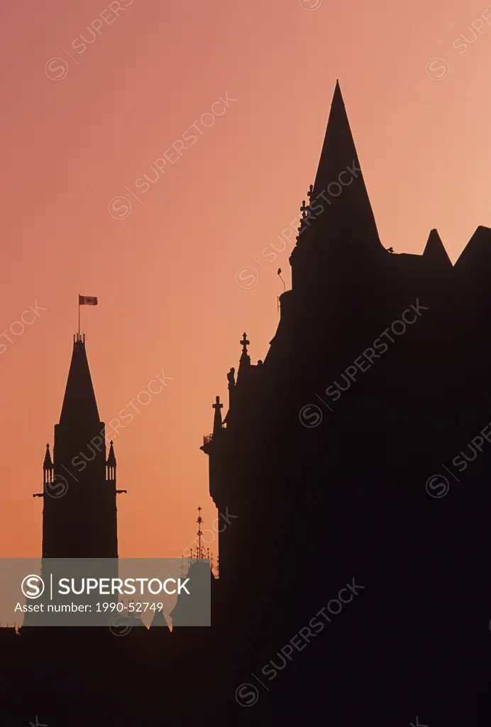 Chateau Laurier and Parliament Buildings at sunset, Ottawa, Ontario, Canada.