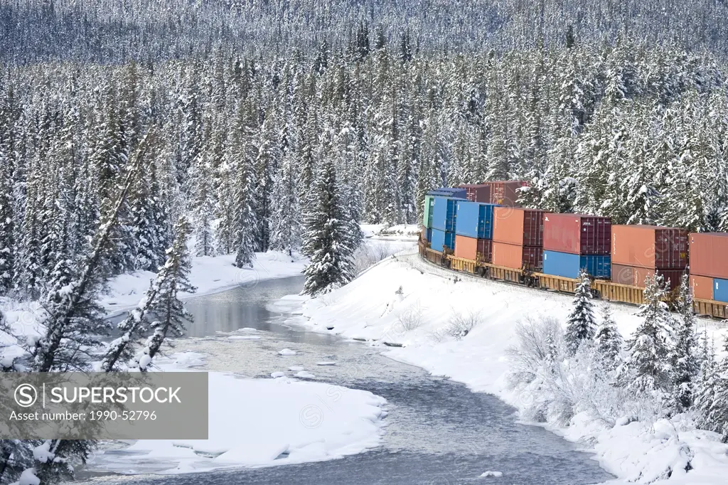 Container Train at Morants Curve in winter, Banff National Park, Alberta, Canada