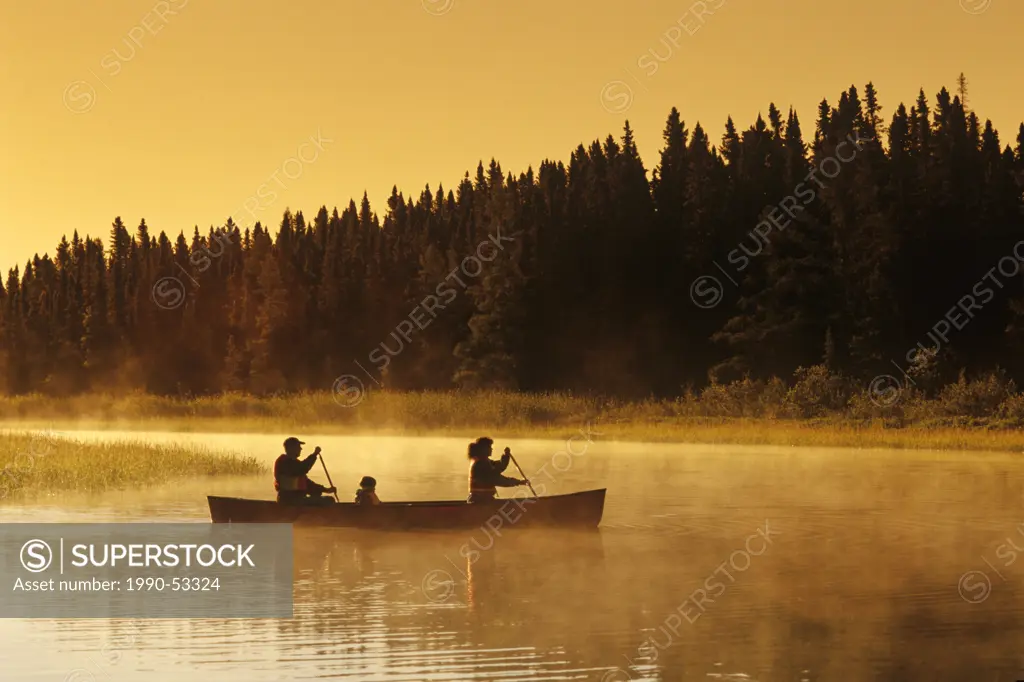 family canoeing, Whiteshell River, Whiteshell Provincial Park, Manitoba, Canada