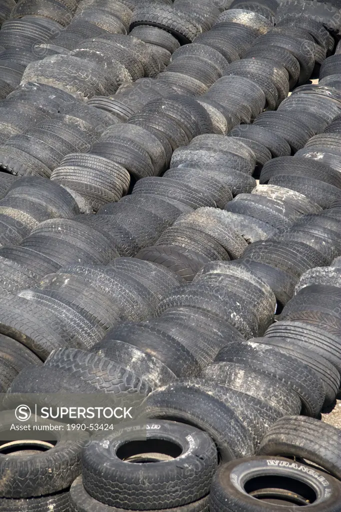 Row upon row of discarded rubber tires, Kelowna, British Columbia, Canada