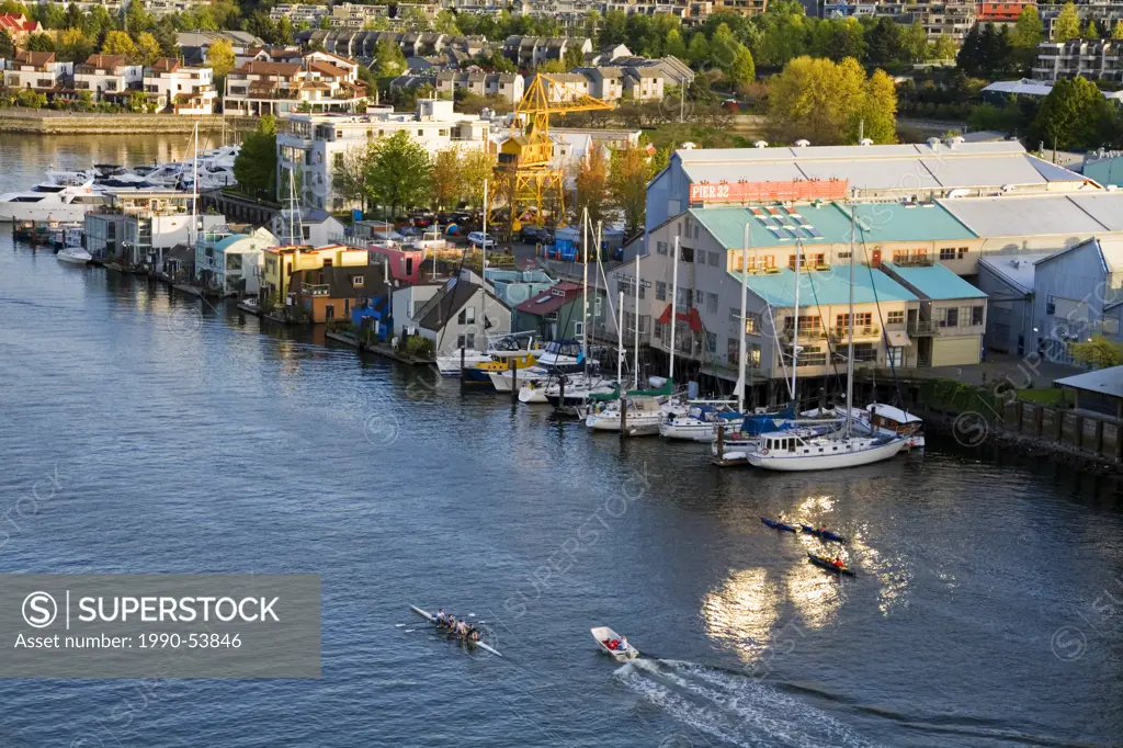 Boats and floating houses in False Creek along Granville Island, from Granville Bridge, Vancouver, British Columbia, Canada.