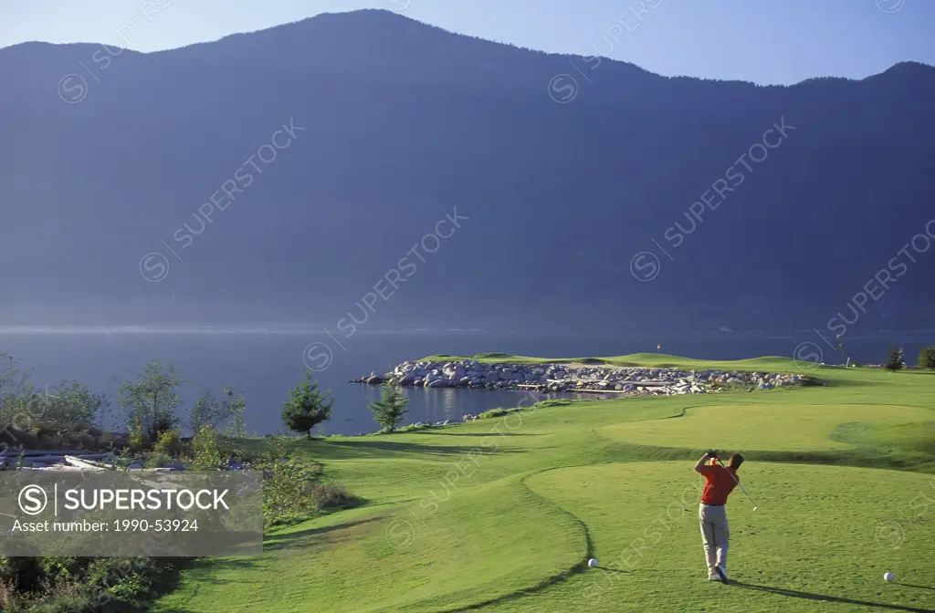 Golfer on Nicklaus North Golf Course, Whistler, British Columbia, Canada.