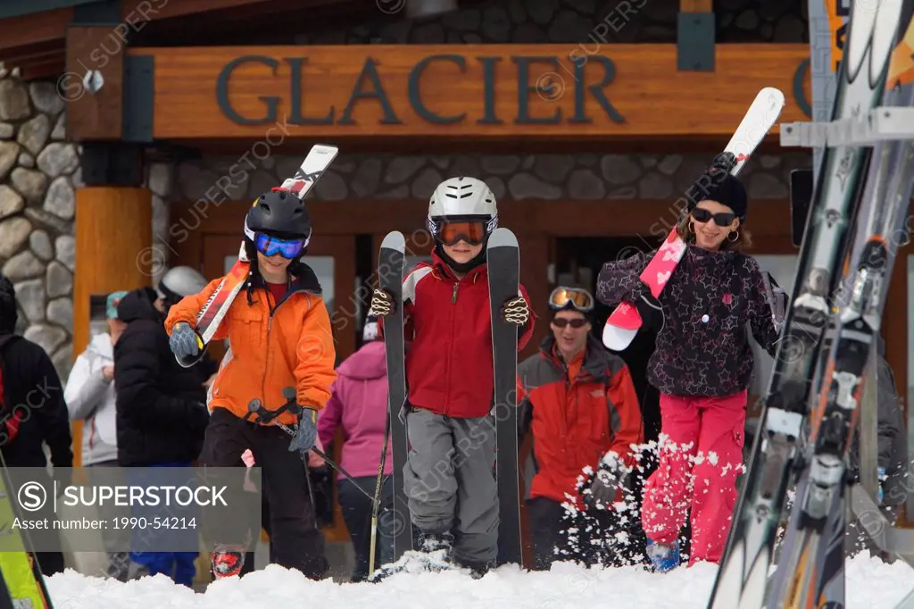 Children ready to ski after a break at the Chalet, Whistler, British Columbia, Canada.