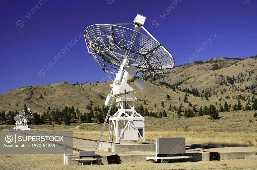 One large satellite dish with three in the background at the Dominion Radio Astrophysical Observatory near Okanagan Falls, BC.