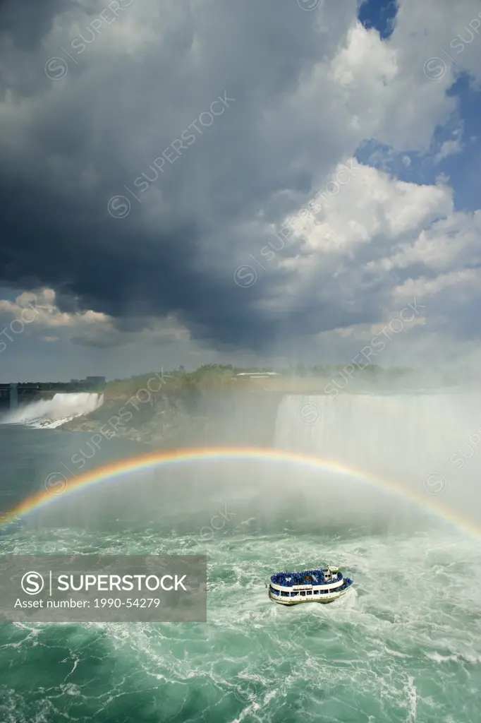 Maid of the Mist at the Base of Horseshoe Falls with the American Falls in the background, Niagara Falls, Ontario, Canada.