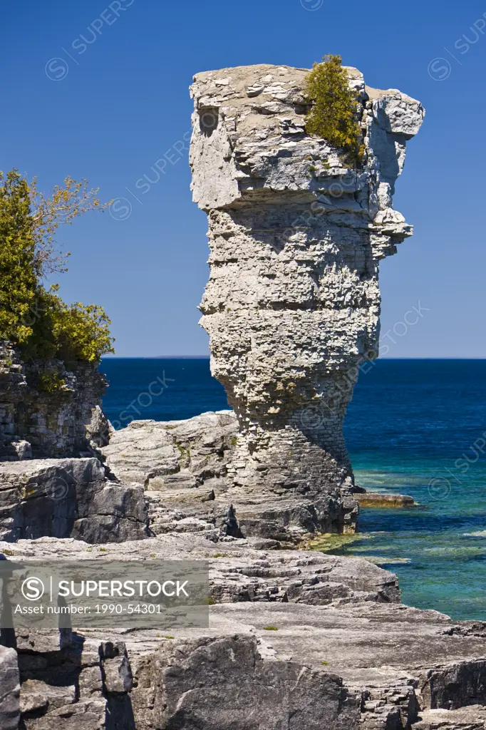 Sea stack along the shoreline of Flowerpot Island in the Fathom Five National Marine Park, Lake Huron, Ontario, Canada
