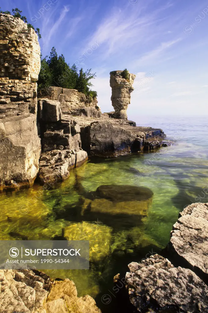 The flowerpot rock formation and clear water of Georgian Bay, Flowerpot Island, Fathom Five National Marine Park, Ontario, Canada.