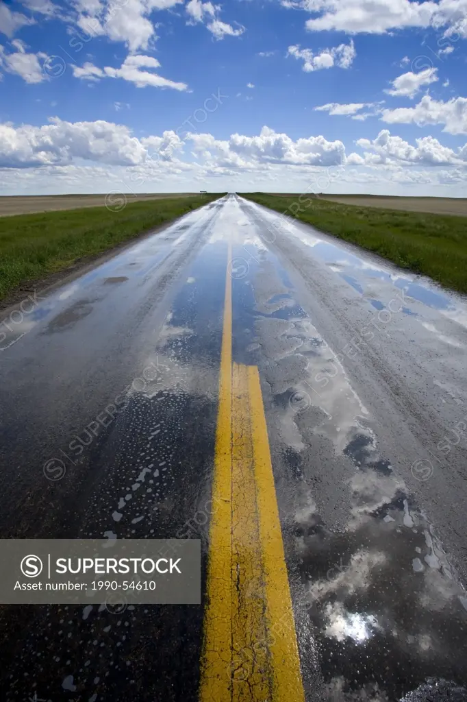 Rural road Hwy 21 after rain shower, southeastern Saskatchewan, Canada