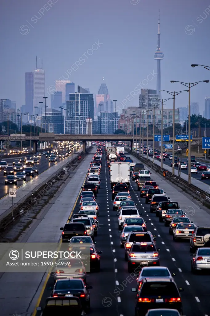 Rush_hour traffic on QEW Queen Elizabeth Way and Toronto city skyline, Toronto, Ontario, Canada.