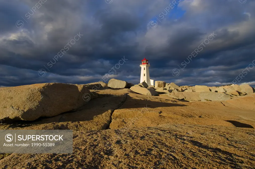 Lighthouse and granite rock formations. Peggy´s Cove, Nova Scotia, Canada.