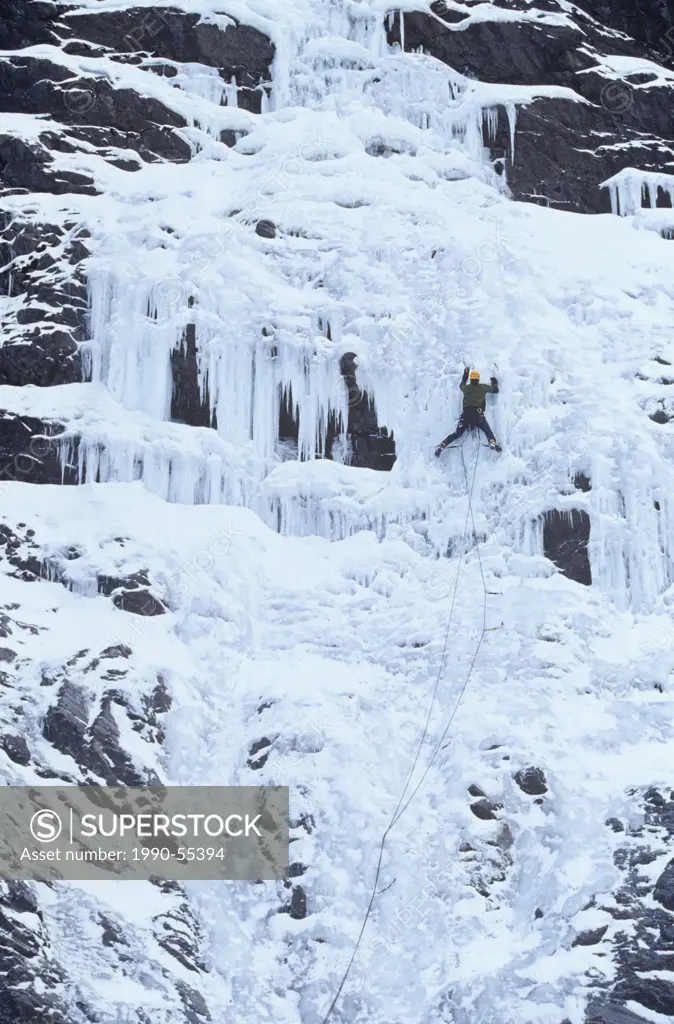 Man ice climbing, Lone Ranger, Smith_Dorian, Alberta, Canada.