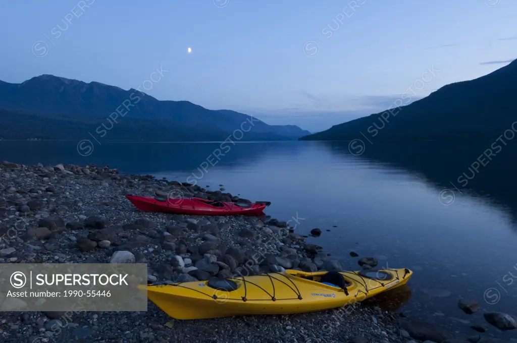 Kayaks on the shores of Slocan Lake at New Denver, British Columbia, Canada