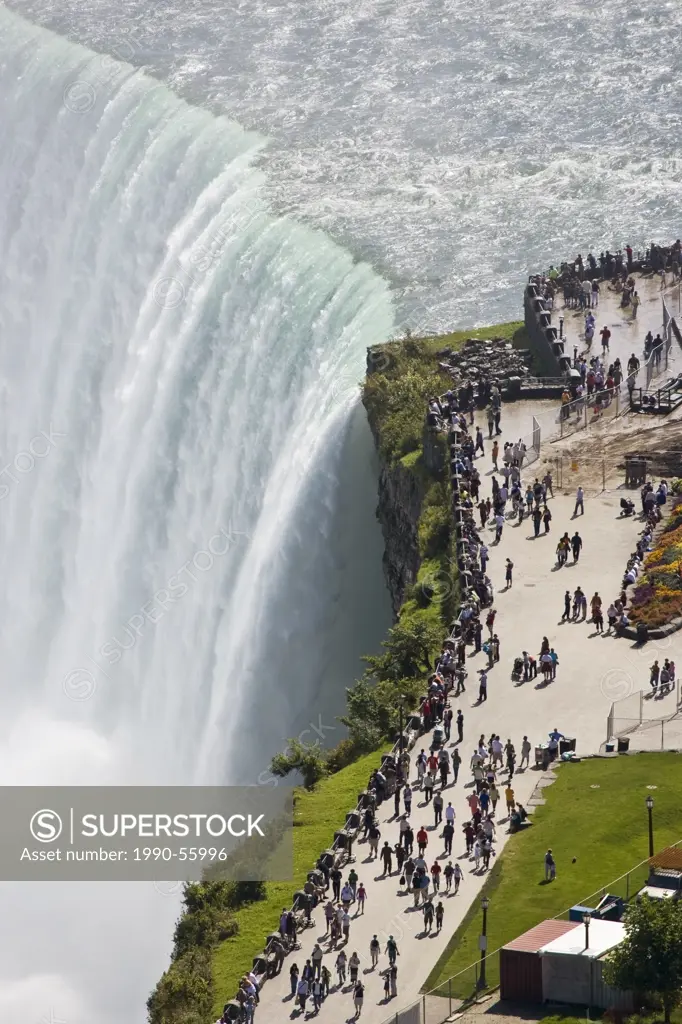 View of Horseshoe Falls and tourists from Skylon Tower, Niagara Falls, Ontario, Canada.
