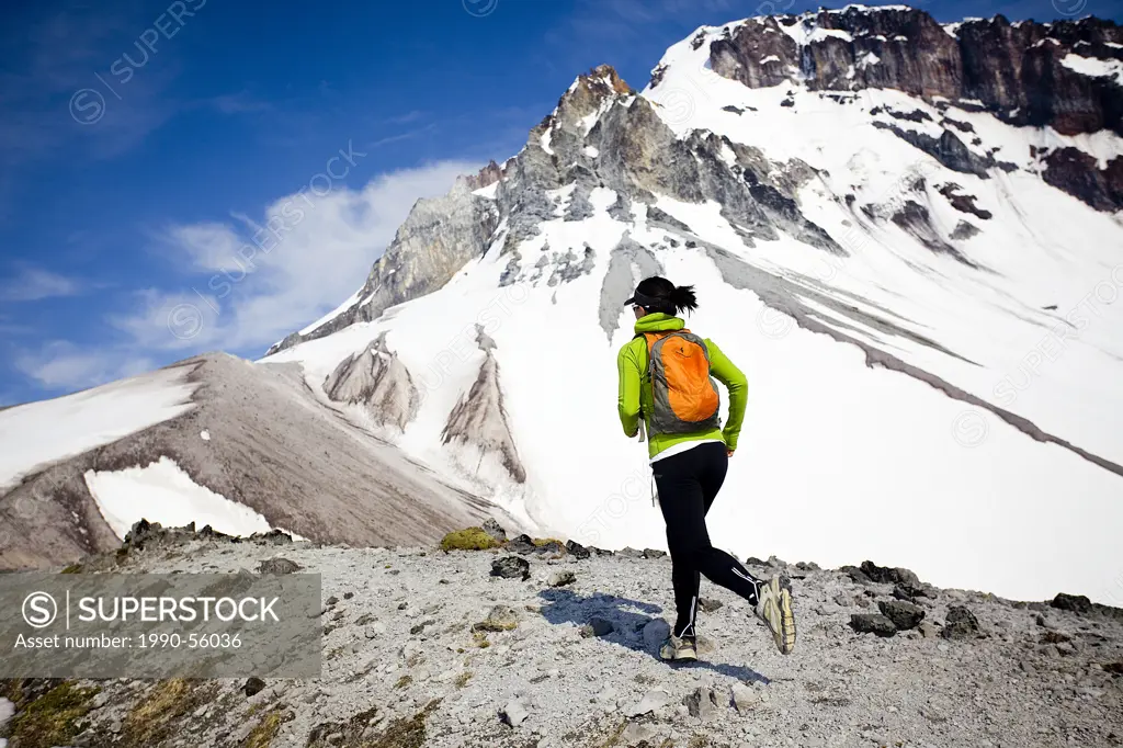 Female runner on Garibaldi Mt. between Whistler and Squamis, BC, Canada